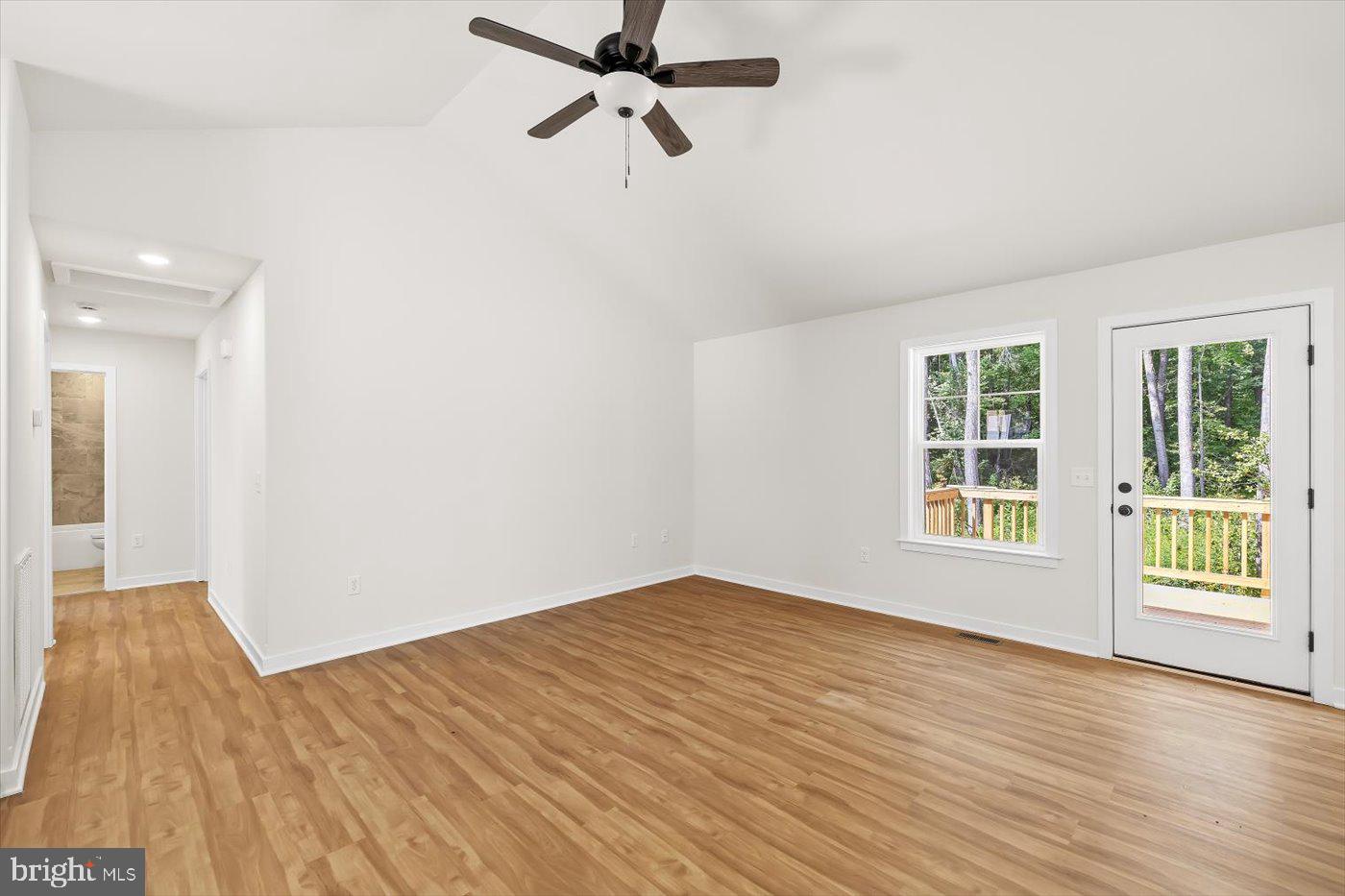 736 Circle Lane Colonial Beach, VA 22443 - Photo 13 of 40 wooden floor in an empty room with a window