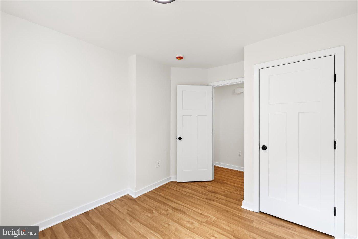 736 Circle Lane Colonial Beach, VA 22443 - Photo 32 of 40 a view of an empty room with wooden floor
