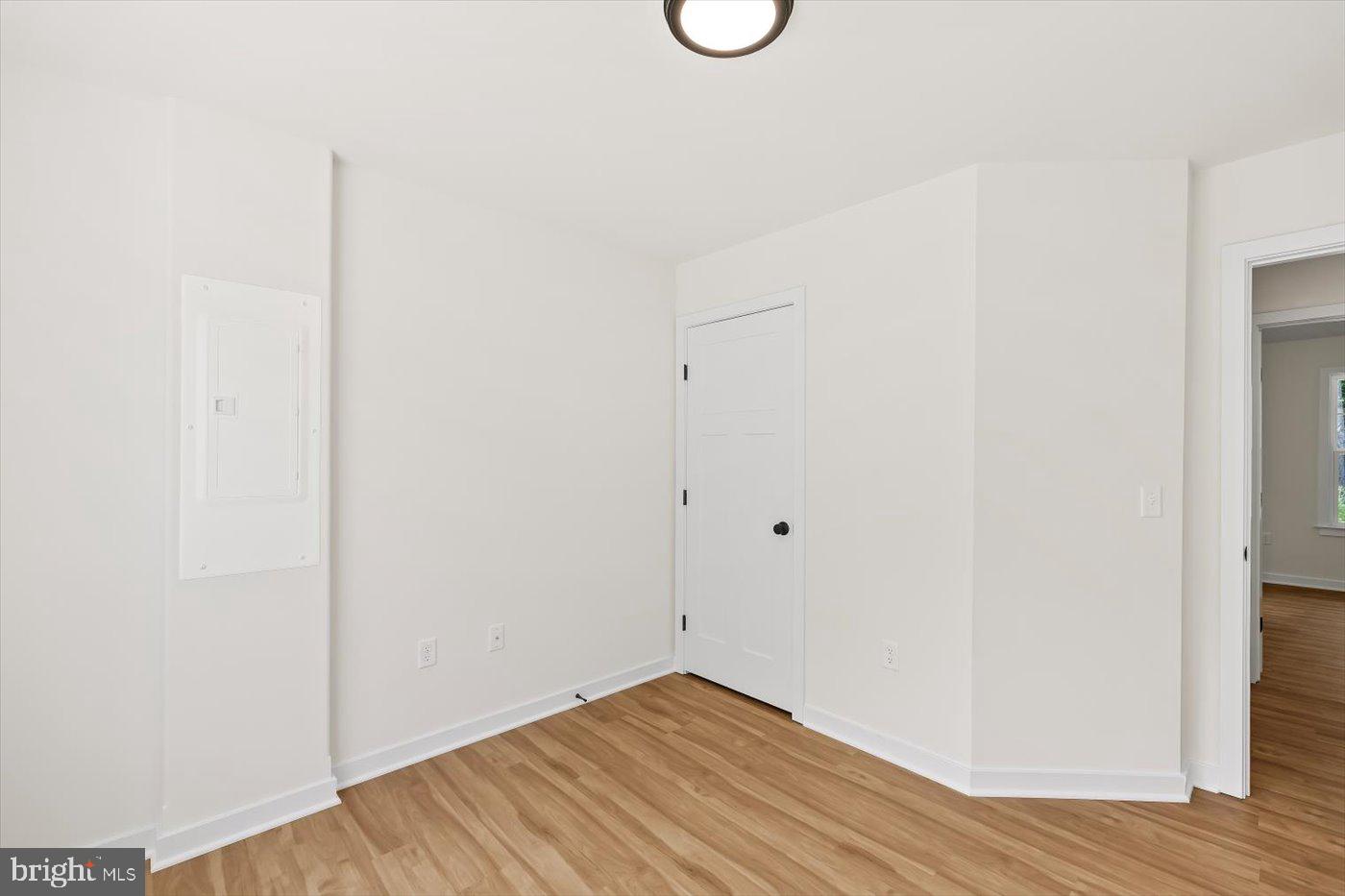 736 Circle Lane Colonial Beach, VA 22443 - Photo 34 of 40 a view of a room with wooden floor