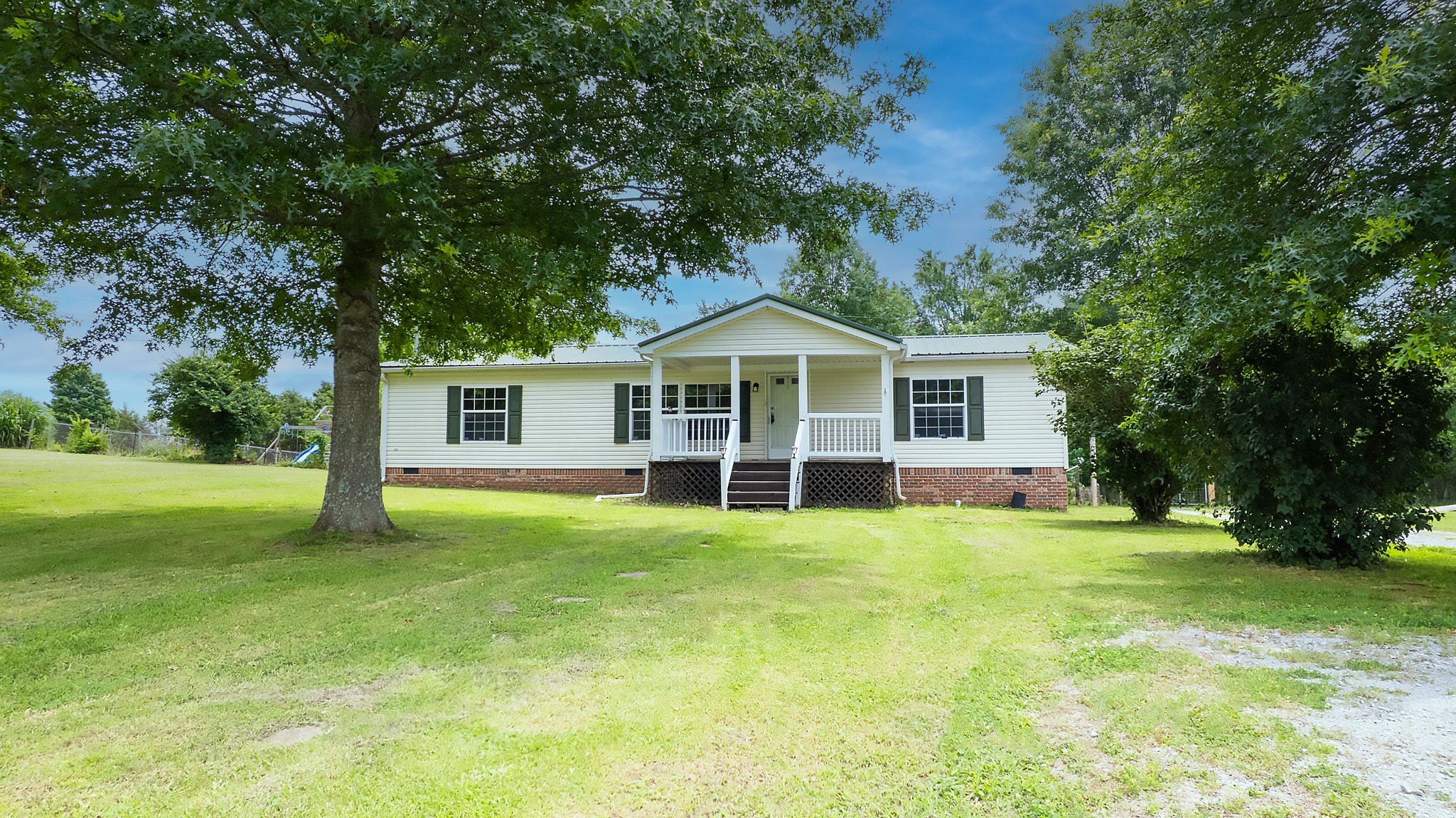 2132 Lasea Road Spring Hill, TN 37174 - Photo 1 of 26 a view of a house with a backyard
