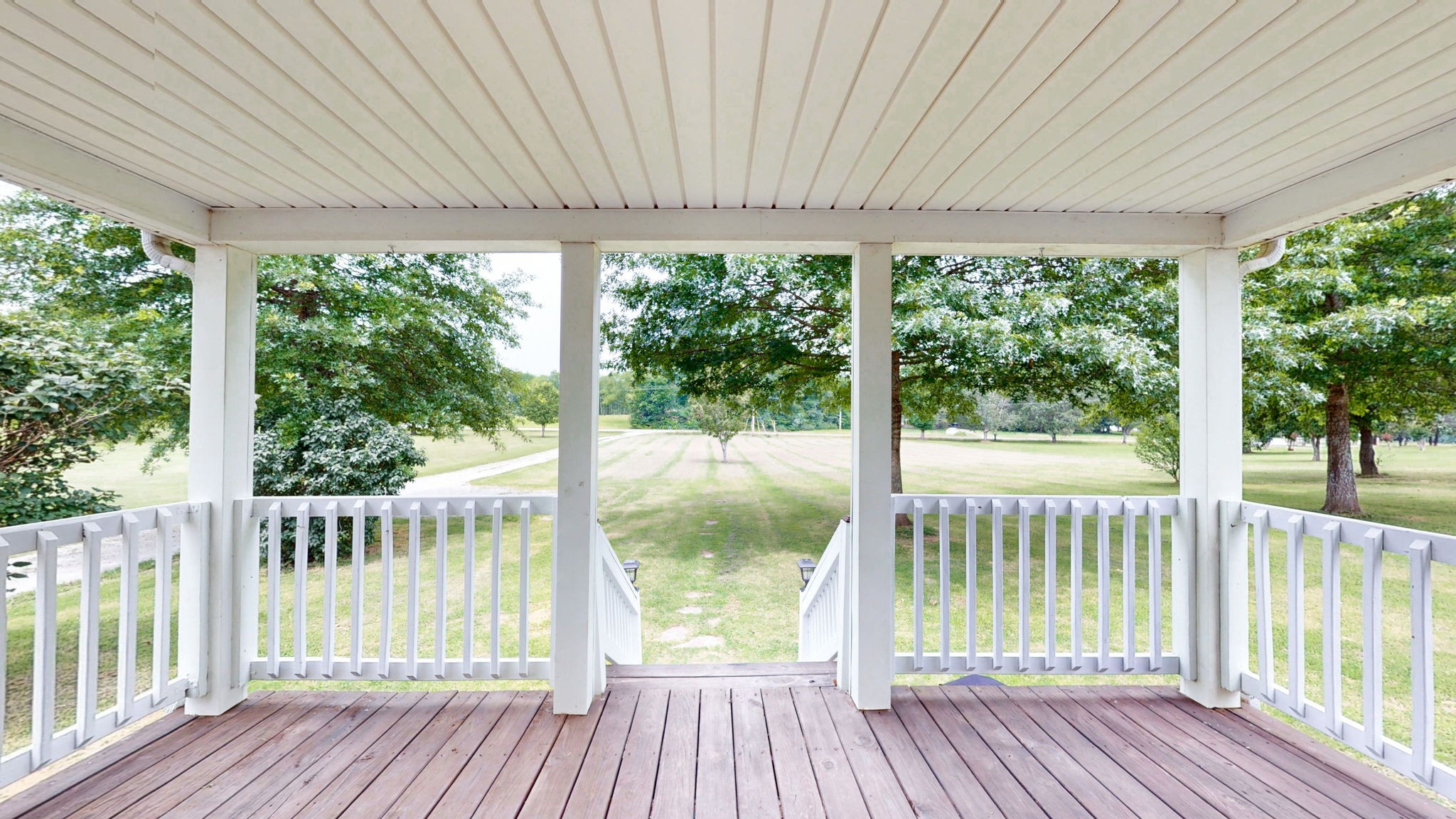 2132 Lasea Road Spring Hill, TN 37174 - Photo 18 of 26 a view of a wooden deck with a yard