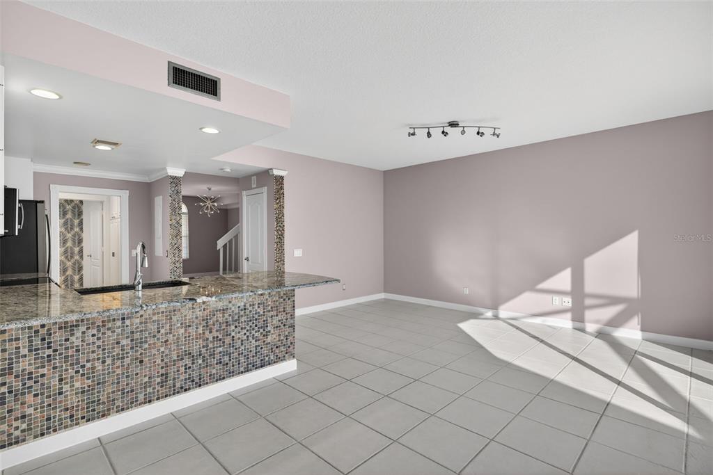 3518 Zanzibar Way Naples, FL 34119 - Photo 12 of 44 a living room with furniture