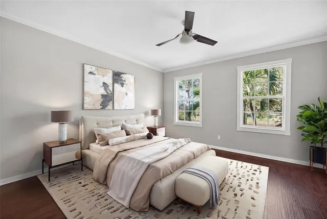 a bedroom with double bed and a window