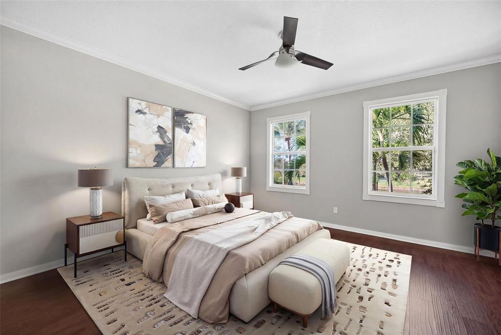 3518 Zanzibar Way Naples, FL 34119 - Photo 15 of 44 a bedroom with double bed and a window