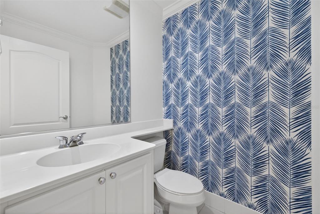 3518 Zanzibar Way Naples, FL 34119 - Photo 26 of 44 a bathroom with a sink a toilet and a mirror