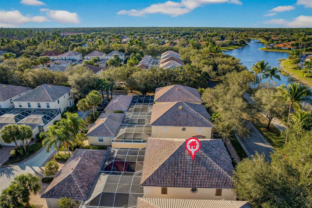 3518 Zanzibar Way Naples, FL 34119 - Photo 38 of 44 an aerial view of houses with a yard