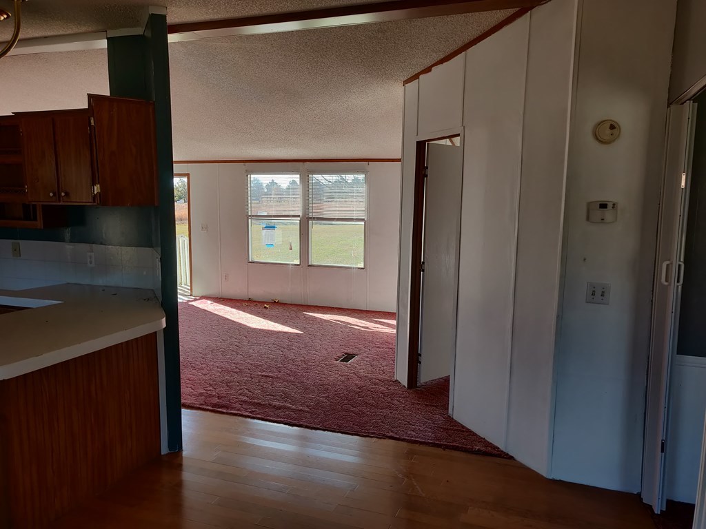 411 Scott Road Elko, GA 31025 - Photo 16 of 27 a view of hallway with wooden floor