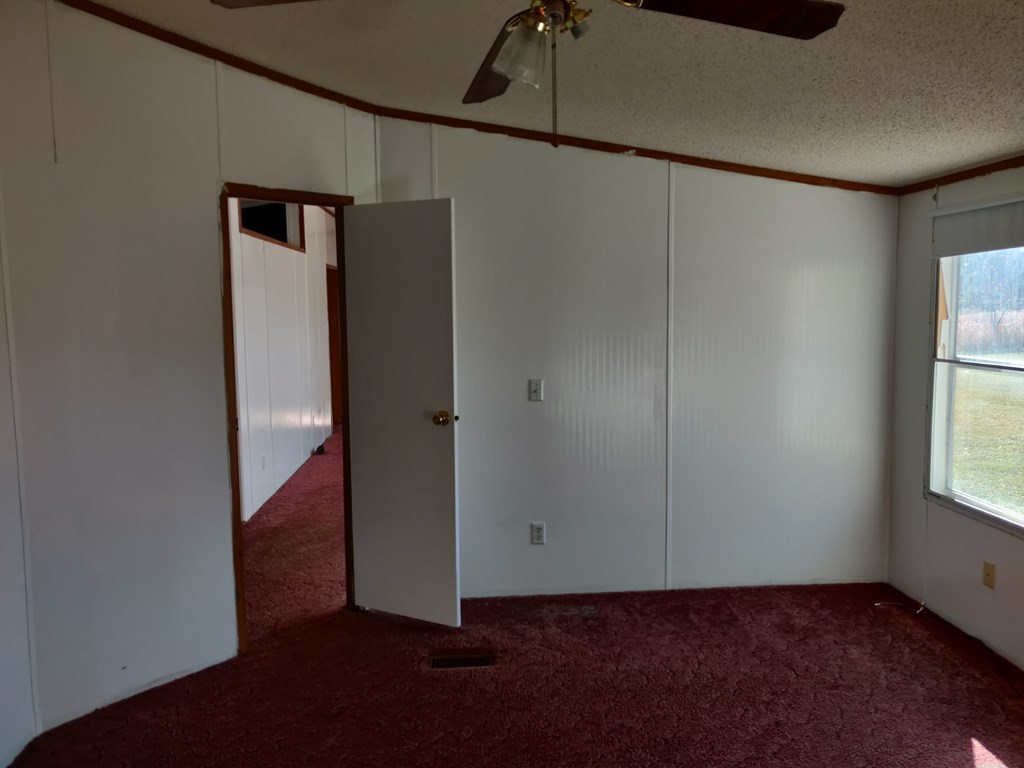 411 Scott Road Elko, GA 31025 - Photo 25 of 27 a view of an empty room with a window
