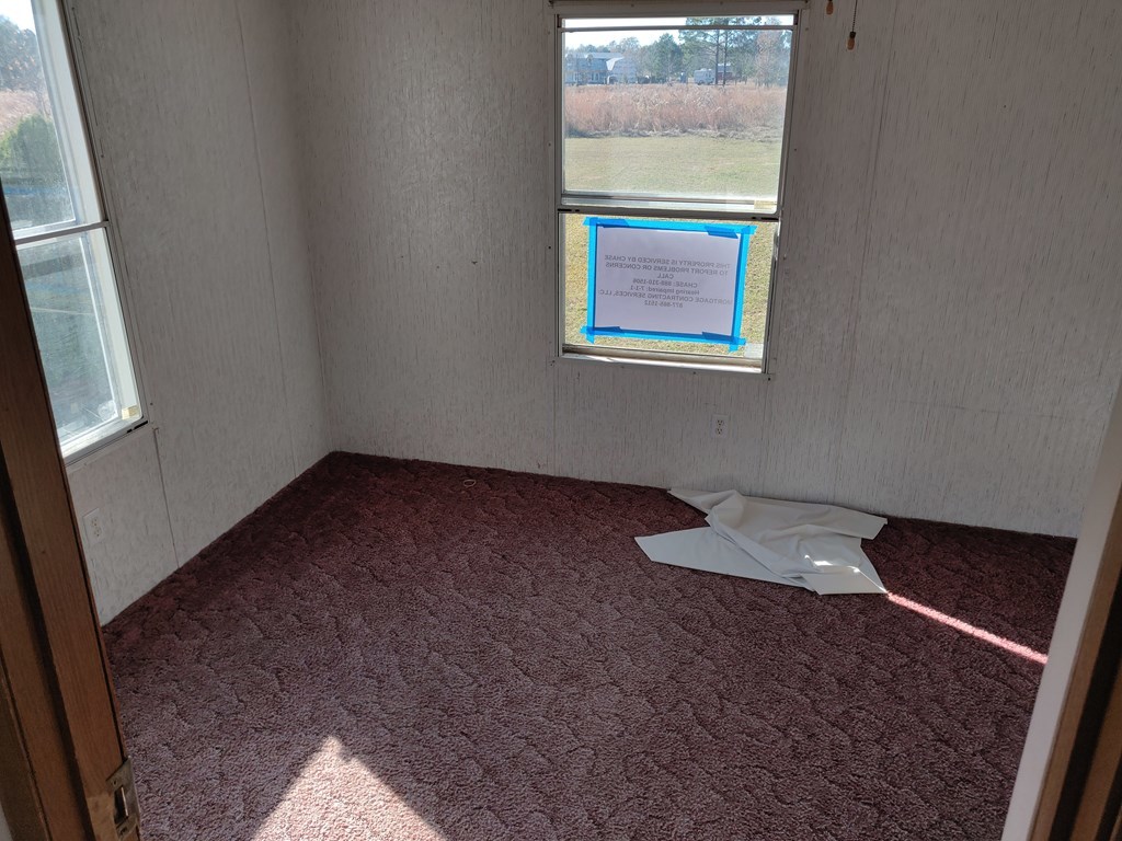 411 Scott Road Elko, GA 31025 - Photo 9 of 27 a view of an empty room and a window