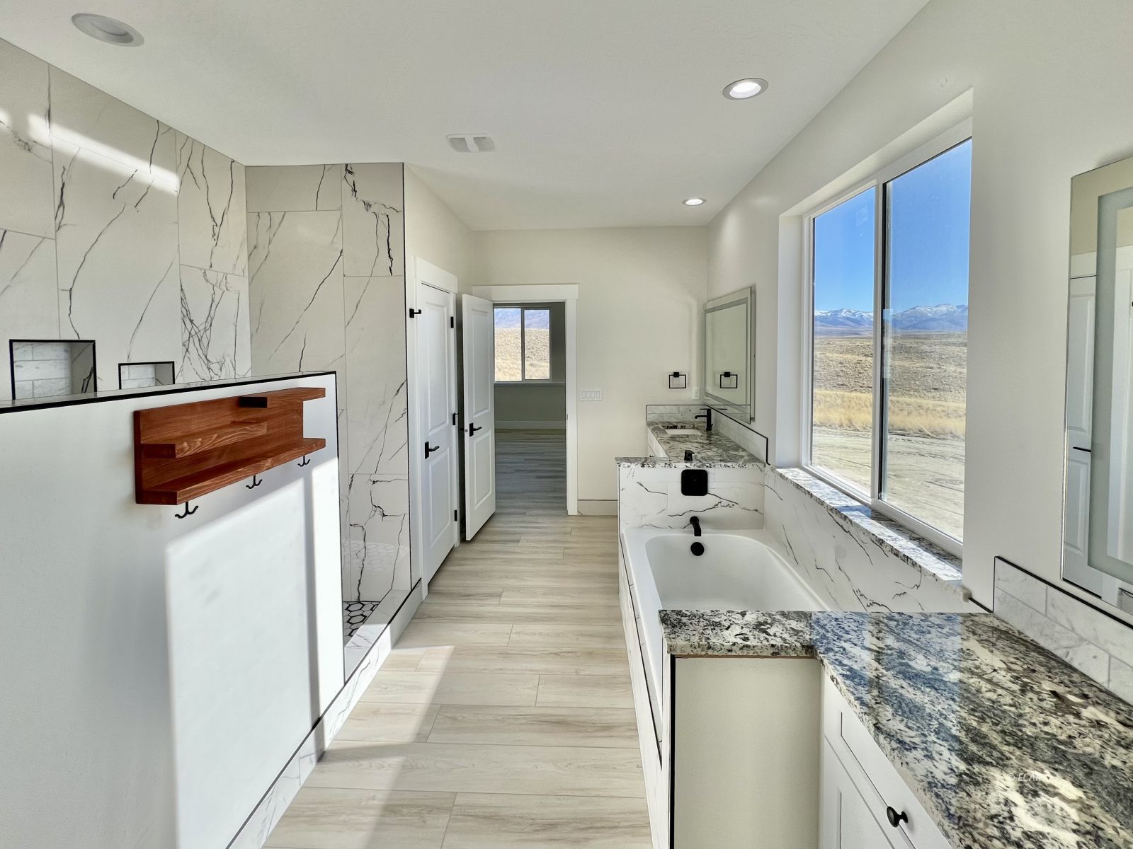 1597 Sun Vly Road, Unit C7 Spring Creek, NV 89815 - Photo 33 of 43 a kitchen with stainless steel appliances granite countertop a refrigerator and a sink