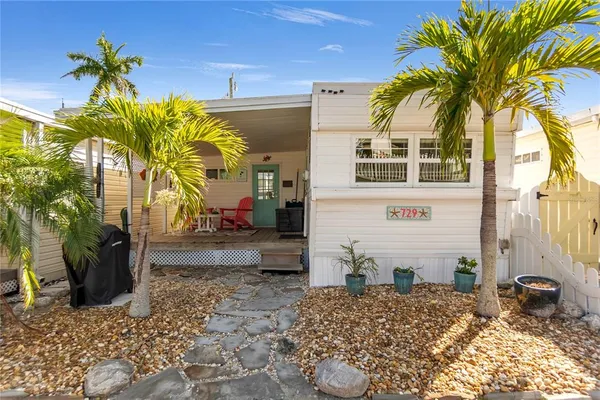 a view of a backyard with a potted plants