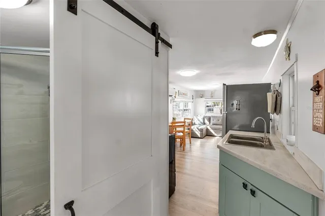 a view of living room with furniture and a window