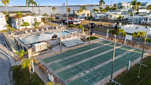 a view of a balcony with sitting area