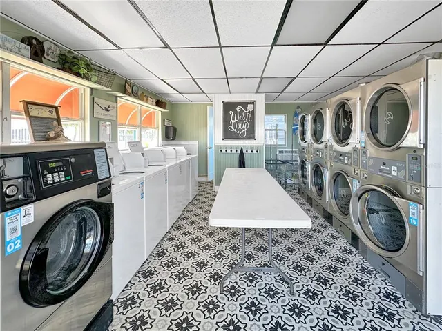 a front view of a house with sitting area