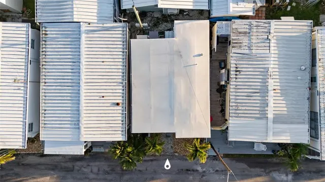 an aerial view of a city with lots of residential buildings