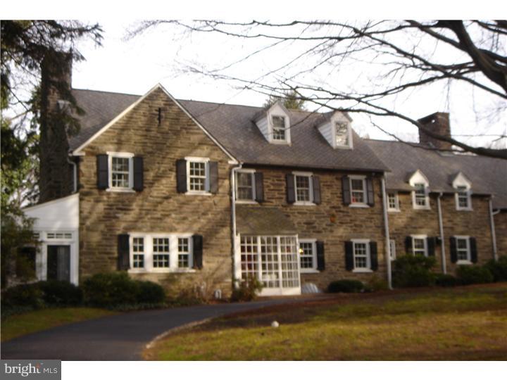 1025 Coates Road Jenkintown, PA 19046 - Photo 2 of 23 a front view of a house with a garden