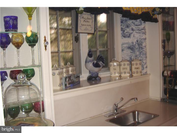 1025 Coates Road Jenkintown, PA 19046 - Photo 11 of 23 a bathroom with a sink and a mirror