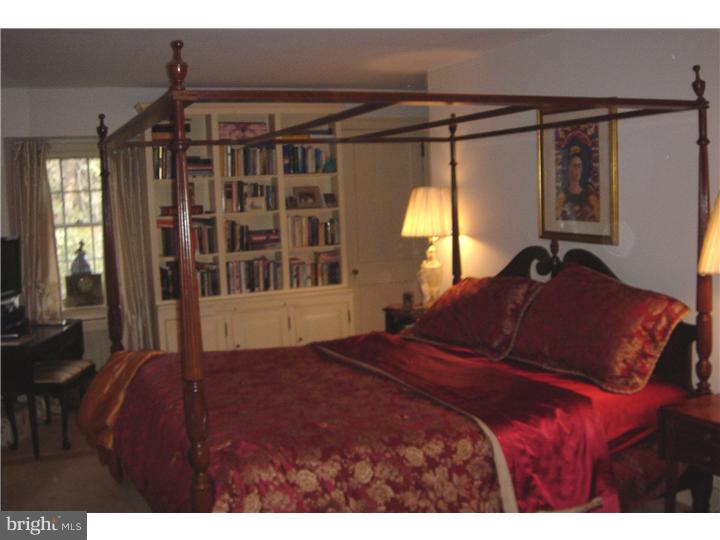 1025 Coates Road Jenkintown, PA 19046 - Photo 17 of 23 a bed sitting in a bedroom next to a window