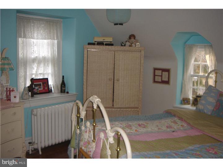 1025 Coates Road Jenkintown, PA 19046 - Photo 18 of 23 a bedroom with furniture and window