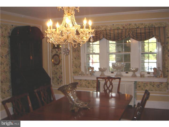 1025 Coates Road Jenkintown, PA 19046 - Photo 10 of 23 a view of a dining room with furniture and chandelier