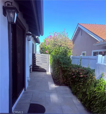 a view of a pathway along the building