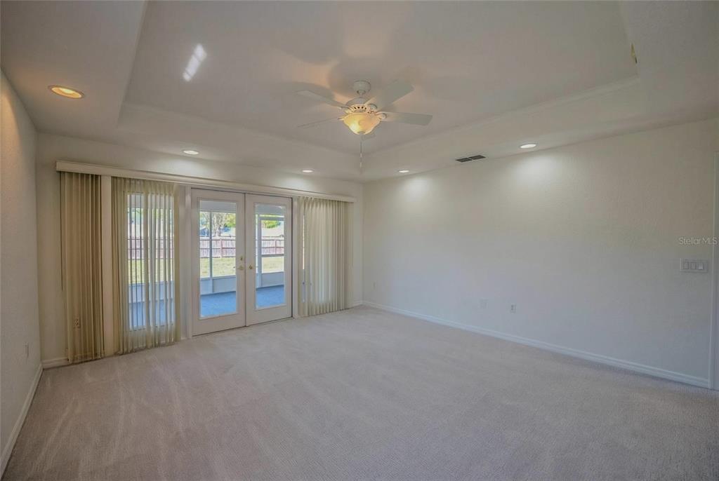 6598 Southeast 11th Loop Ocala, FL 34472 - Photo 12 of 49 a view of an empty room with a window