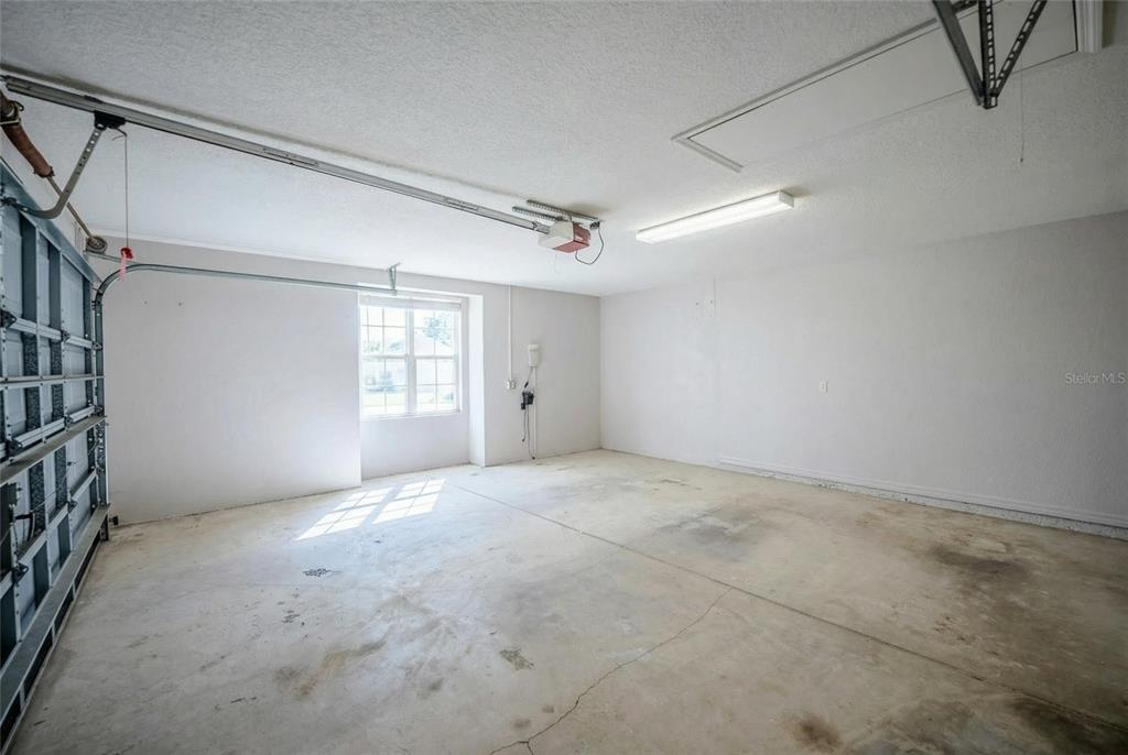 6598 Southeast 11th Loop Ocala, FL 34472 - Photo 27 of 49 a view of an empty room with a window