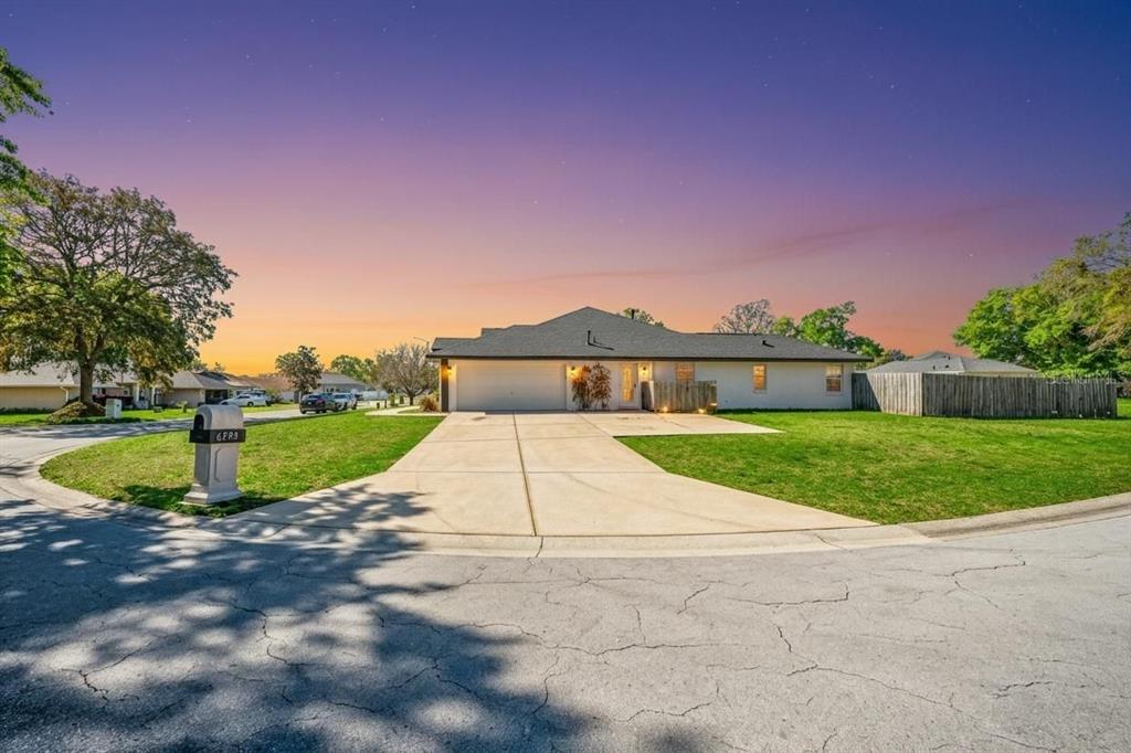 6598 Southeast 11th Loop Ocala, FL 34472 - Photo 30 of 49 a view of yard with swimming pool and green space