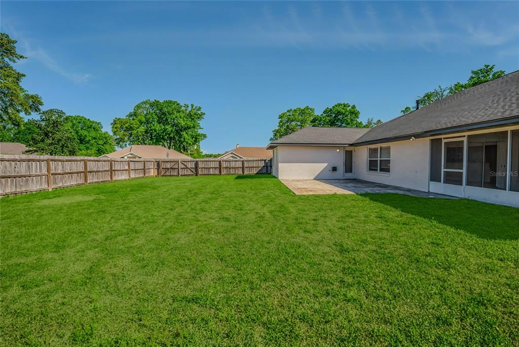 6598 Southeast 11th Loop Ocala, FL 34472 - Photo 41 of 49 a house view with a garden space
