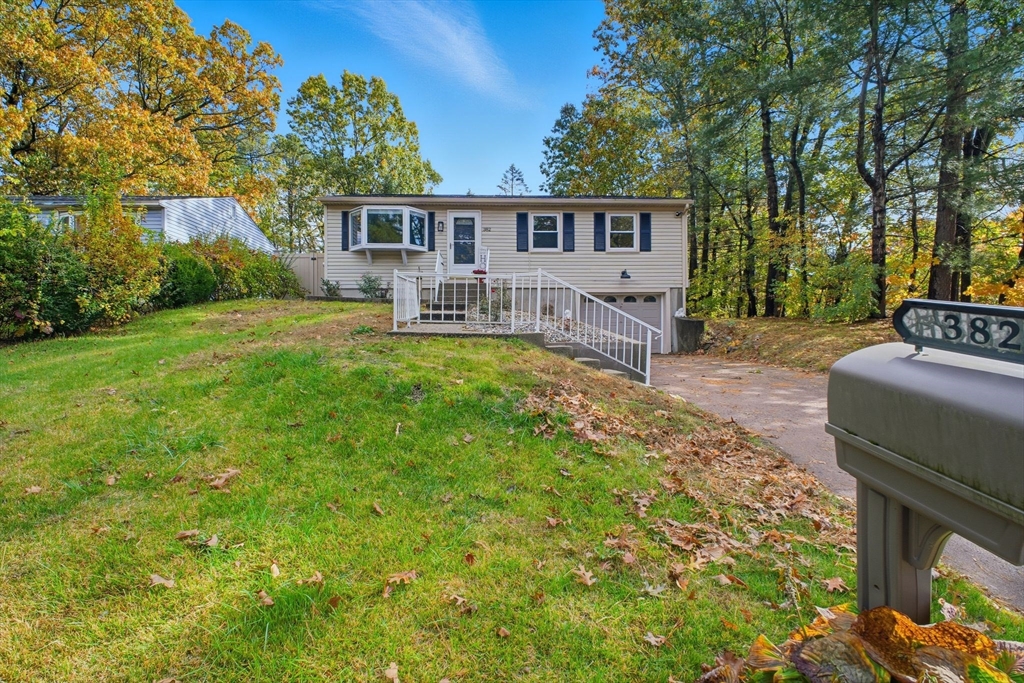 382 North Brook Road Springfield, MA 01119 - Photo 1 of 31 a view of a house with backyard and sitting area