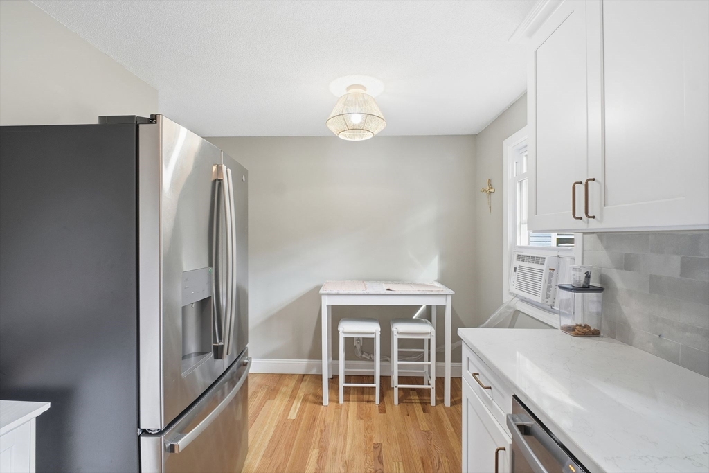 382 North Brook Road Springfield, MA 01119 - Photo 11 of 31 a kitchen with a refrigerator and a sink
