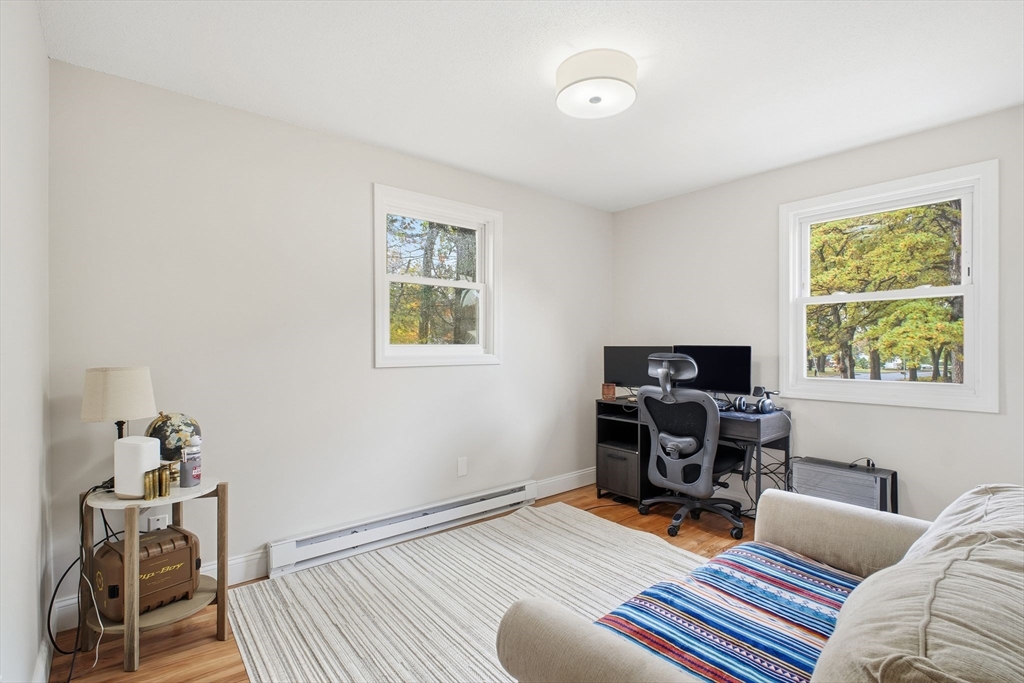 382 North Brook Road Springfield, MA 01119 - Photo 12 of 31 a living room with furniture and a flat screen tv