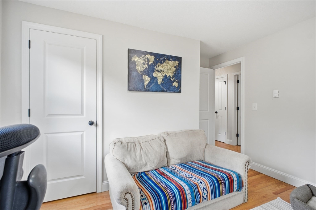 382 North Brook Road Springfield, MA 01119 - Photo 13 of 31 a bedroom with a bed and a painting on the wall