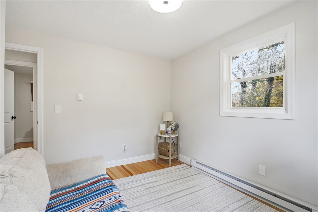 382 North Brook Road Springfield, MA 01119 - Photo 14 of 31 a bedroom with a bed and a window