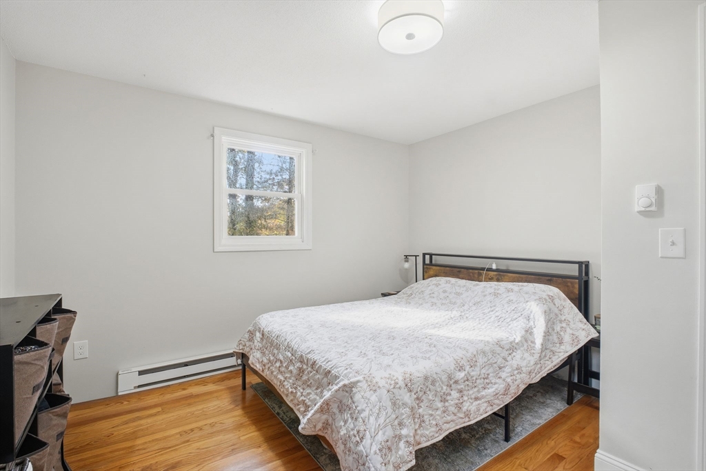 382 North Brook Road Springfield, MA 01119 - Photo 16 of 31 a bedroom with a bed and a window