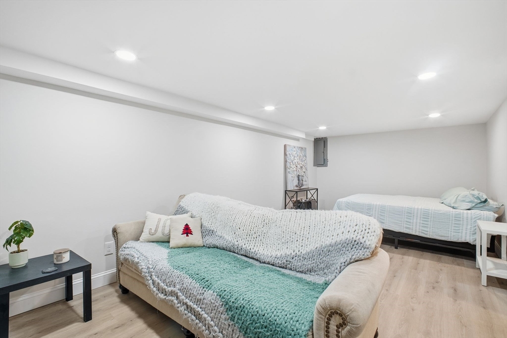 382 North Brook Road Springfield, MA 01119 - Photo 22 of 31 a bedroom with two beds and a couch