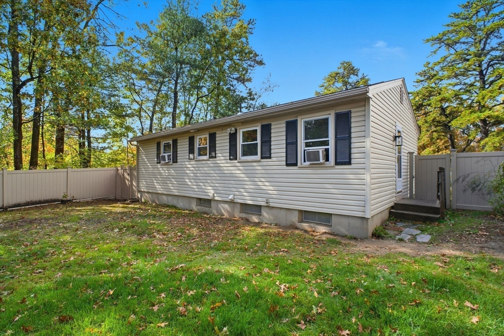 382 North Brook Road Springfield, MA 01119 - Photo 29 of 31 a backyard of a house with table and chairs