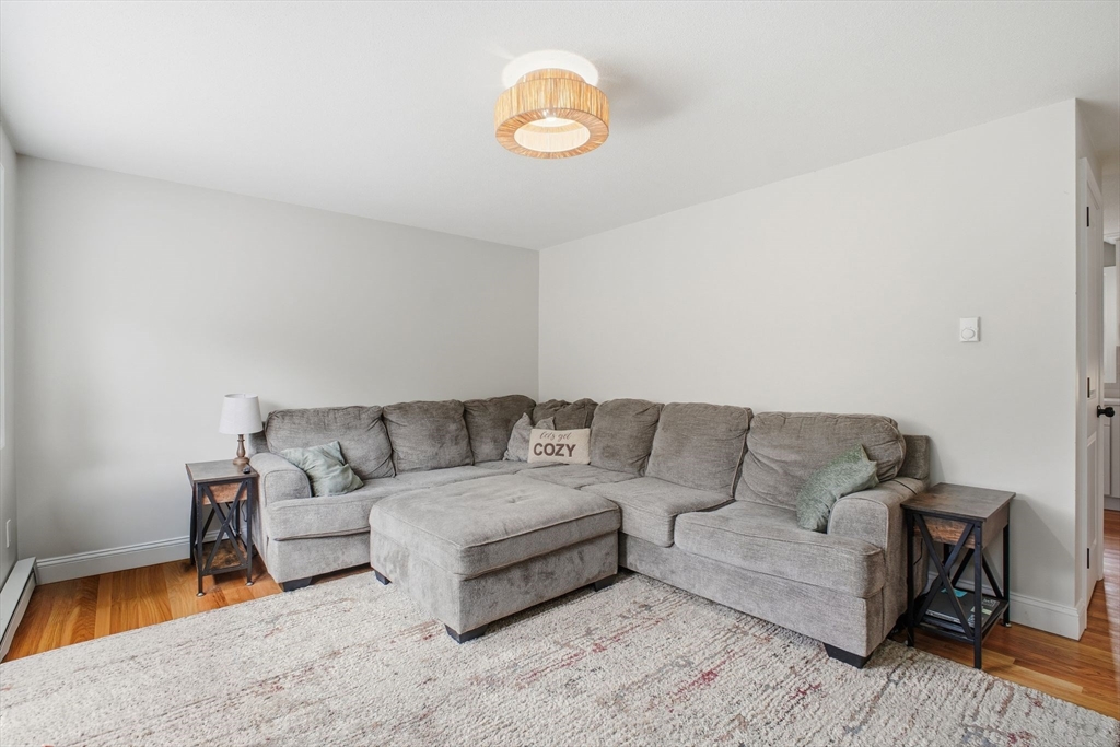 382 North Brook Road Springfield, MA 01119 - Photo 3 of 31 a living room with furniture and a couch