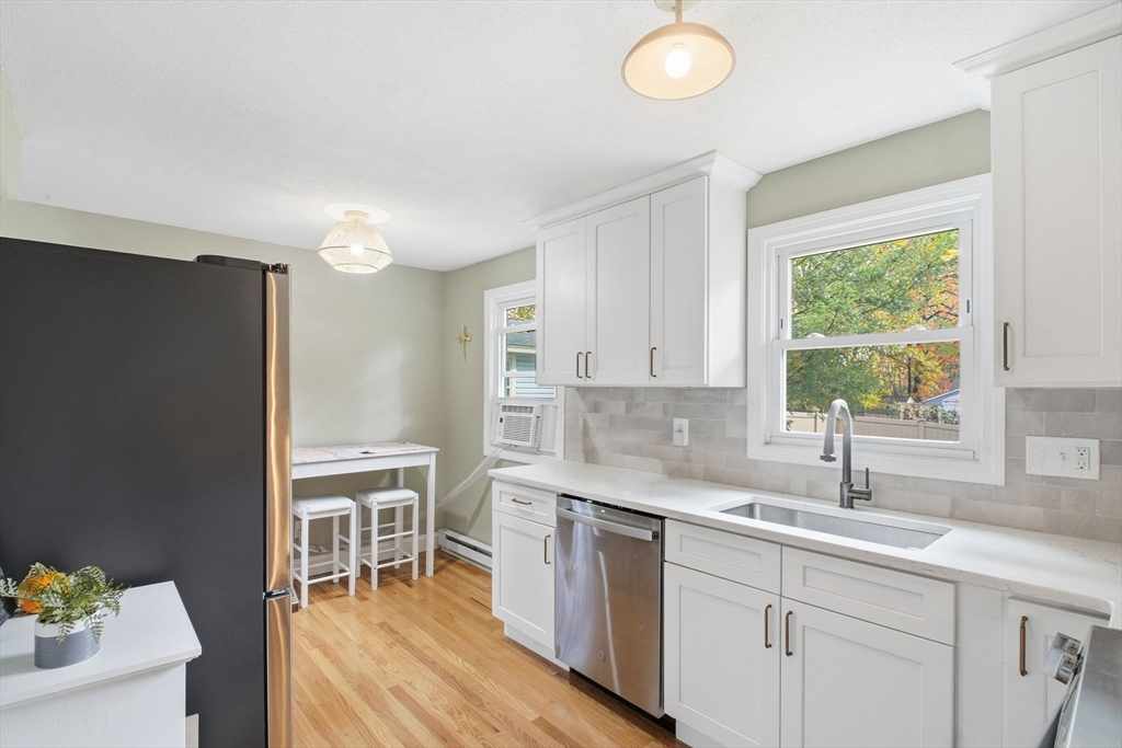 382 North Brook Road Springfield, MA 01119 - Photo 7 of 31 a kitchen with a sink and a window
