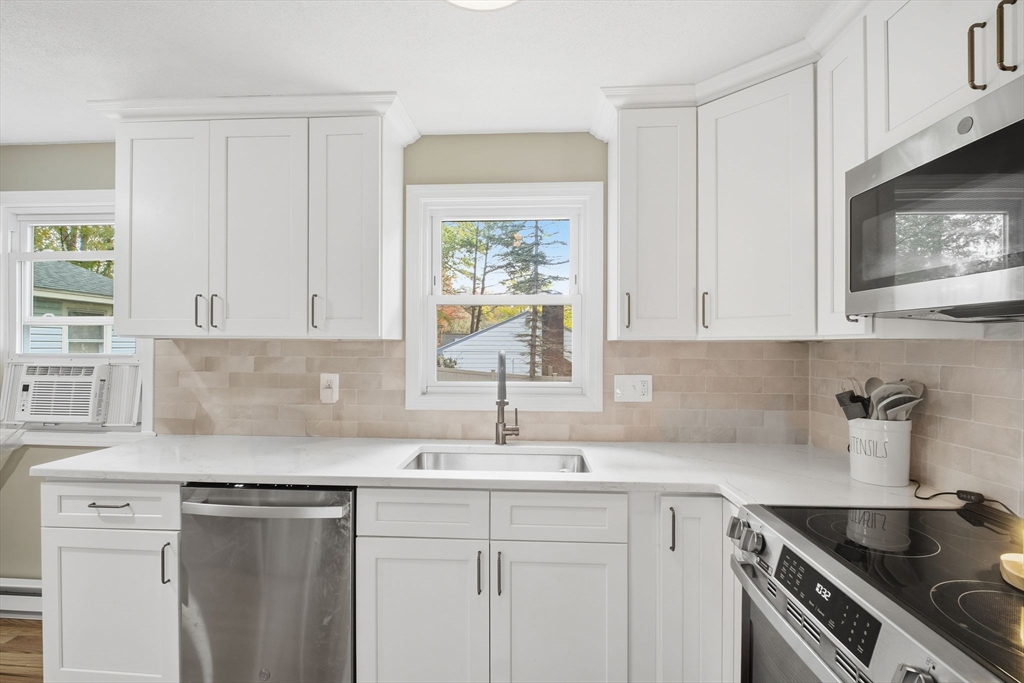 382 North Brook Road Springfield, MA 01119 - Photo 8 of 31 a kitchen with appliances a sink and cabinets