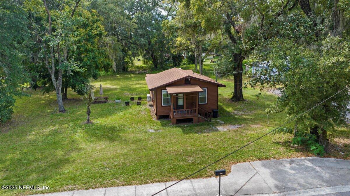 9034 Crystal Springs Road Jacksonville, FL 32221 - Photo 19 of 34 a house view with a garden space