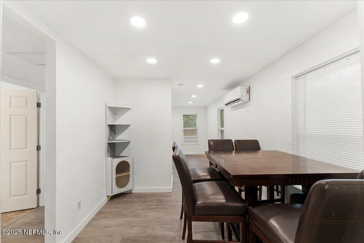 9034 Crystal Springs Road Jacksonville, FL 32221 - Photo 8 of 34 a view of a dining room with furniture