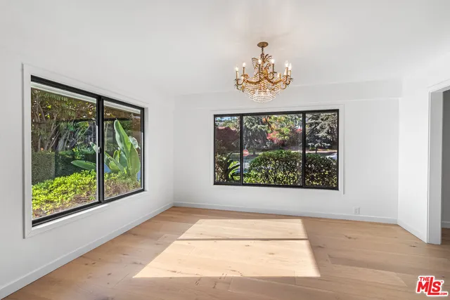 a view of a room with a large window