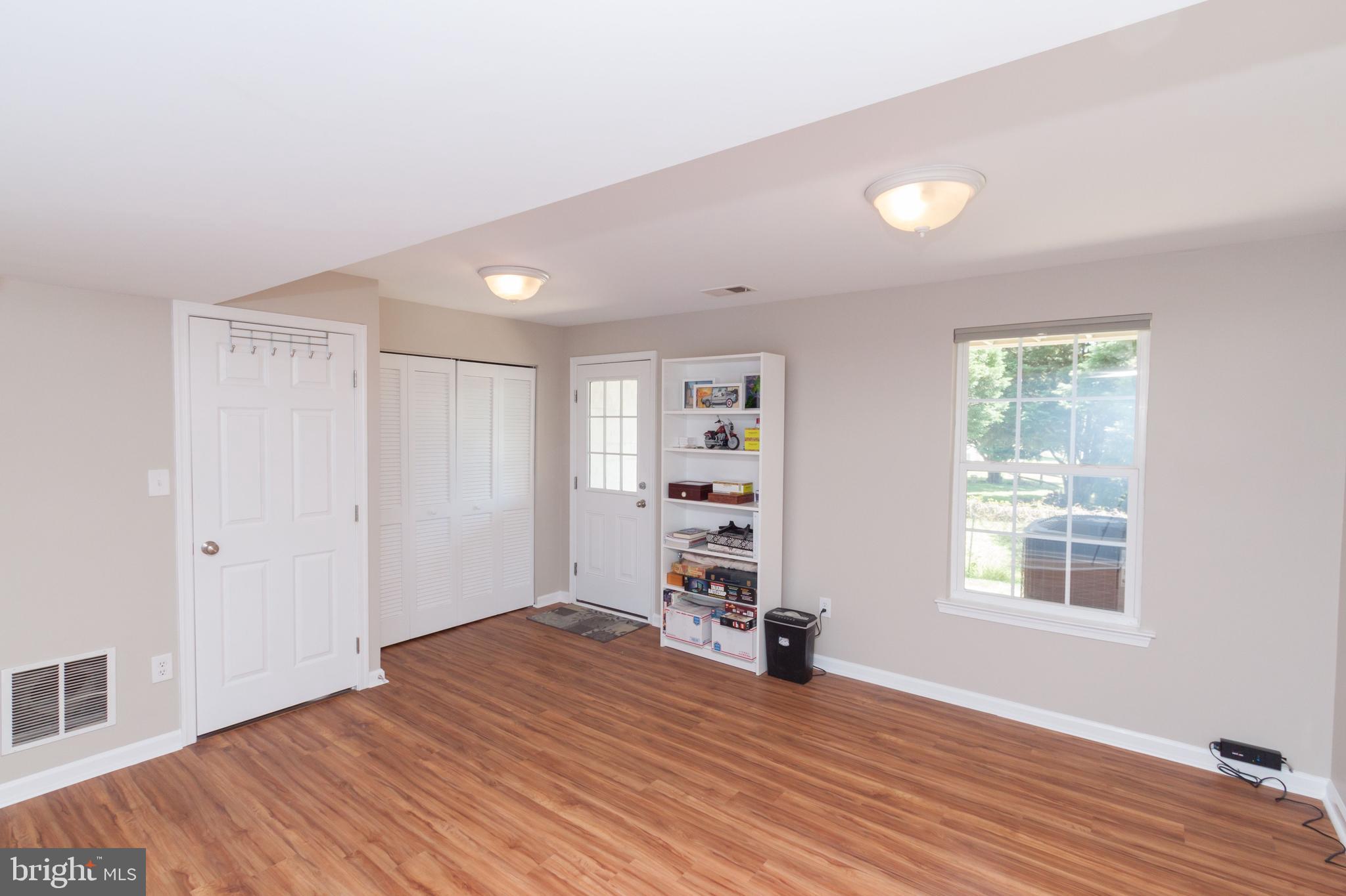 23575 Devonshire Road, Unit 90 Millsboro, DE 19966 - Photo 2 of 16 First floor Flex room with half bath and laundry