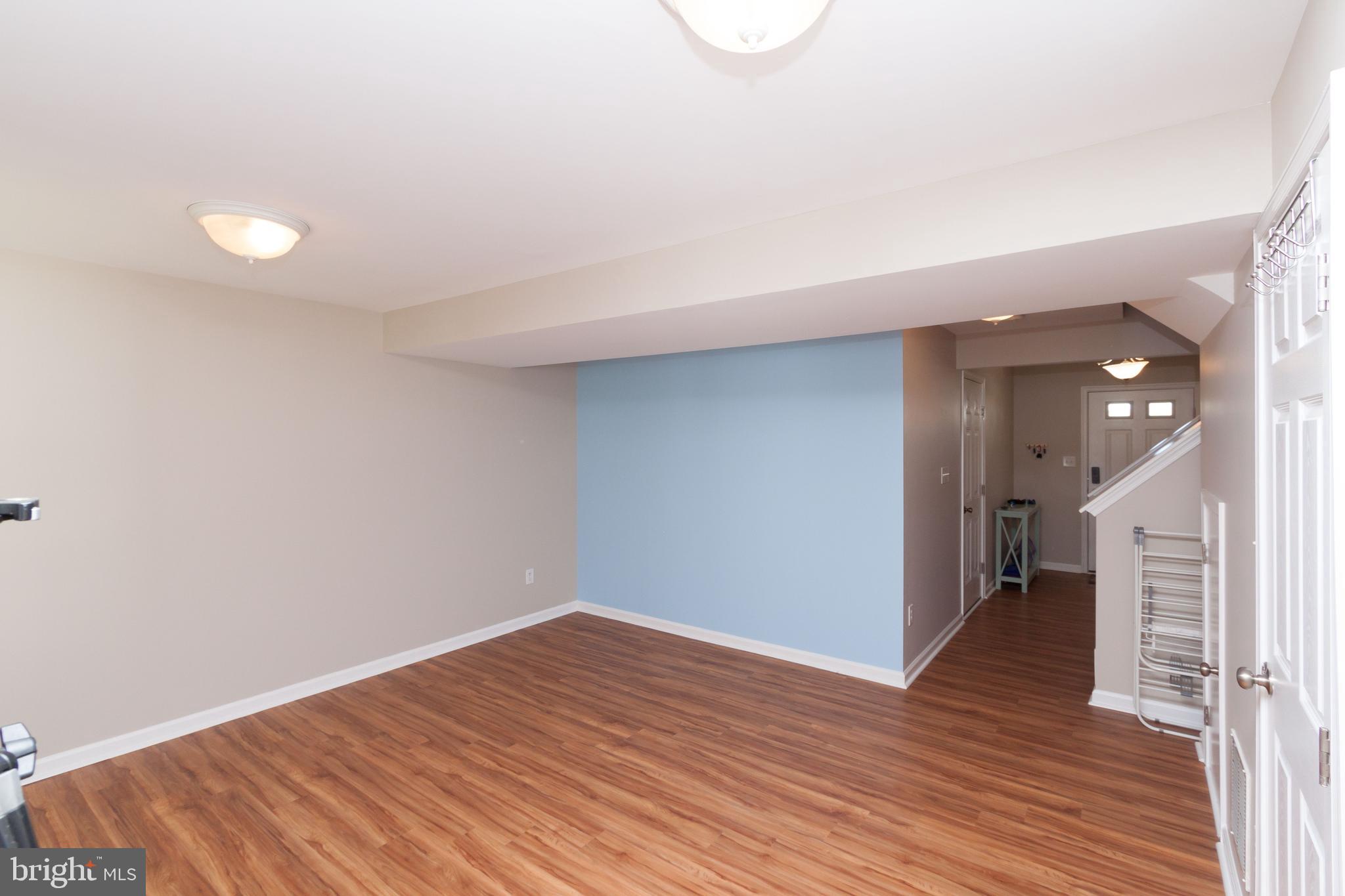 23575 Devonshire Road, Unit 90 Millsboro, DE 19966 - Photo 4 of 16 First floor Flex room with half bath and laundry