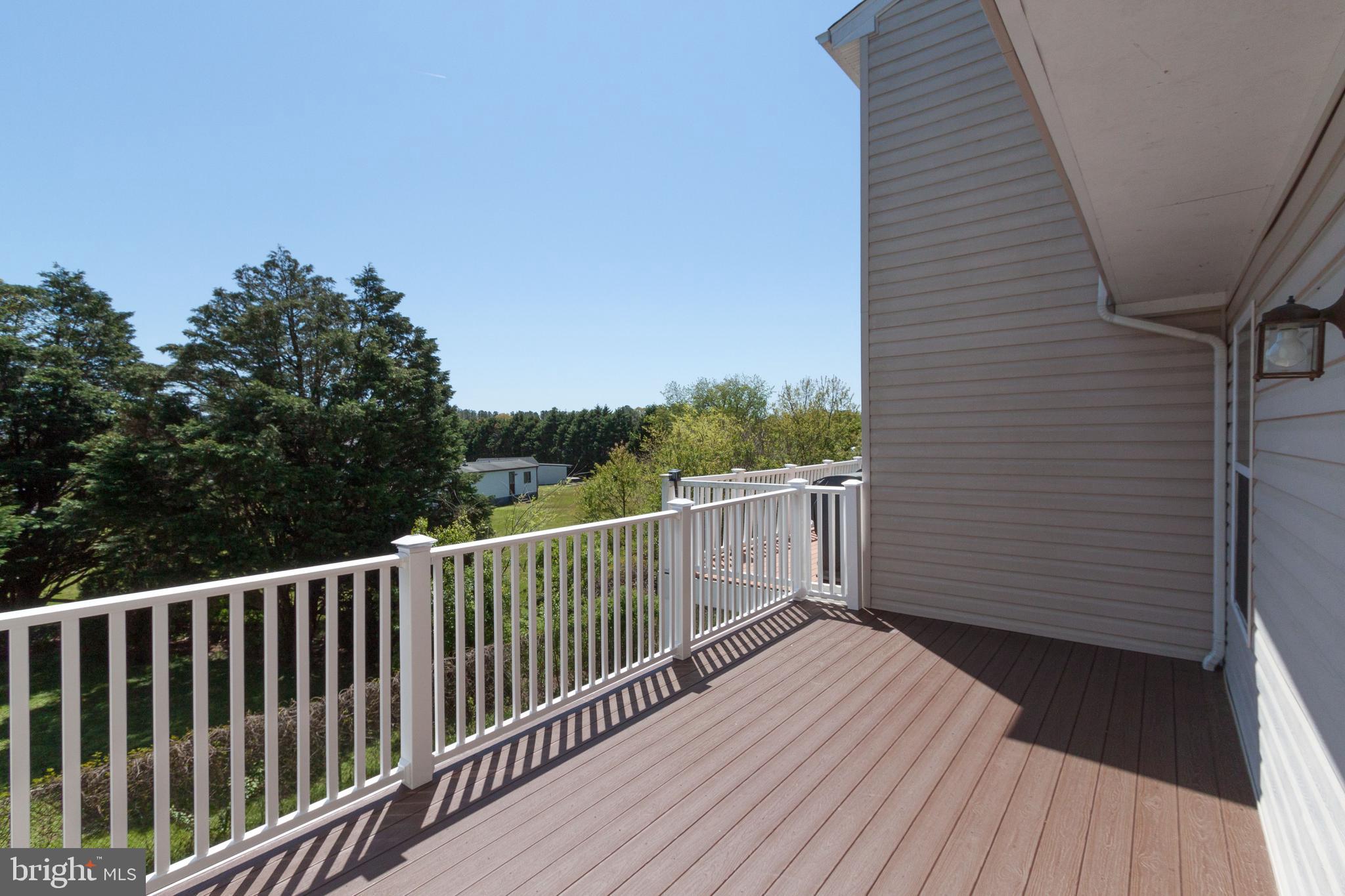 23575 Devonshire Road, Unit 90 Millsboro, DE 19966 - Photo 9 of 16 Brand new deck off the kitchen