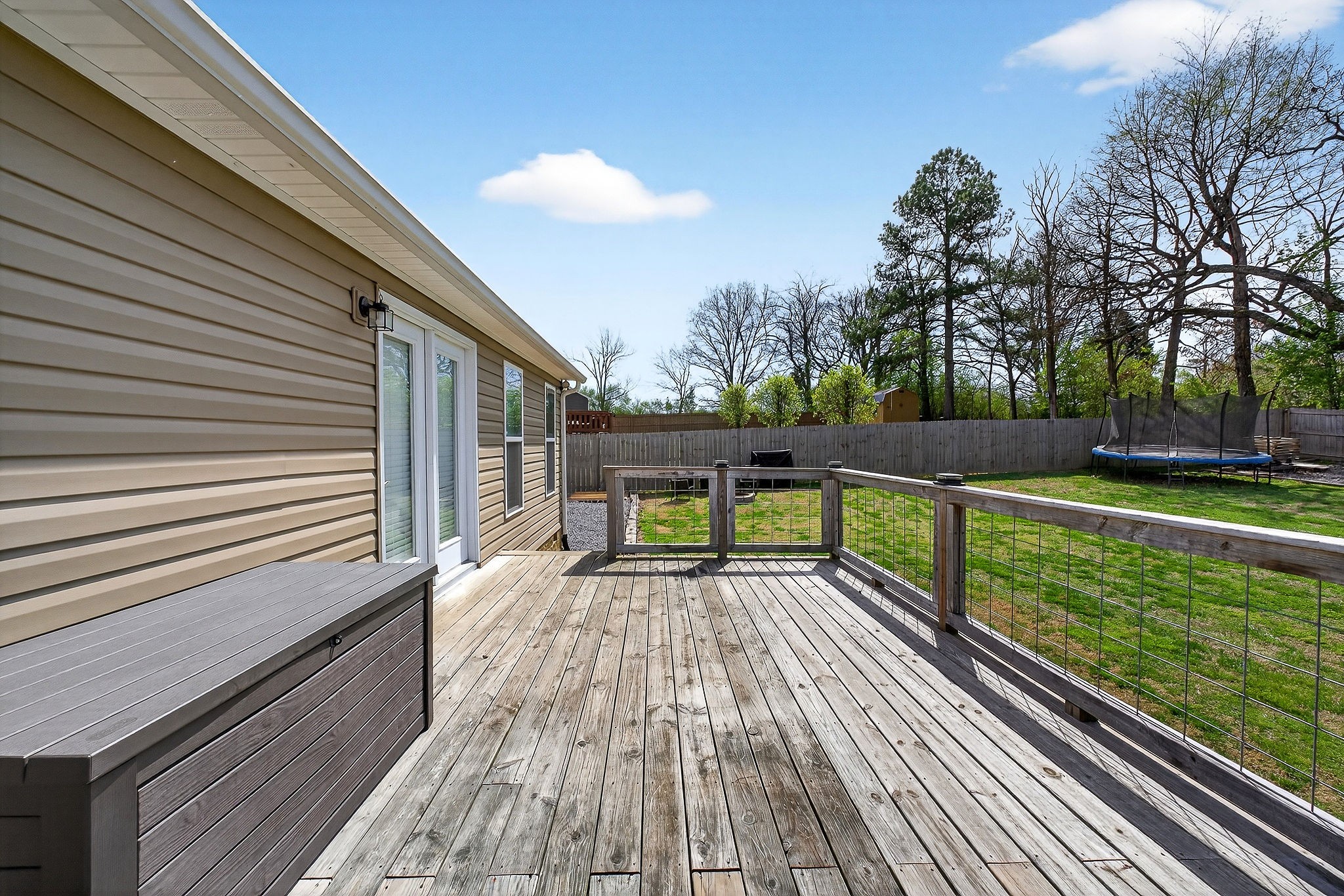 311 Valley Point Baxter, TN 38544 - Photo 12 of 37 a porch with a bench next to a yard