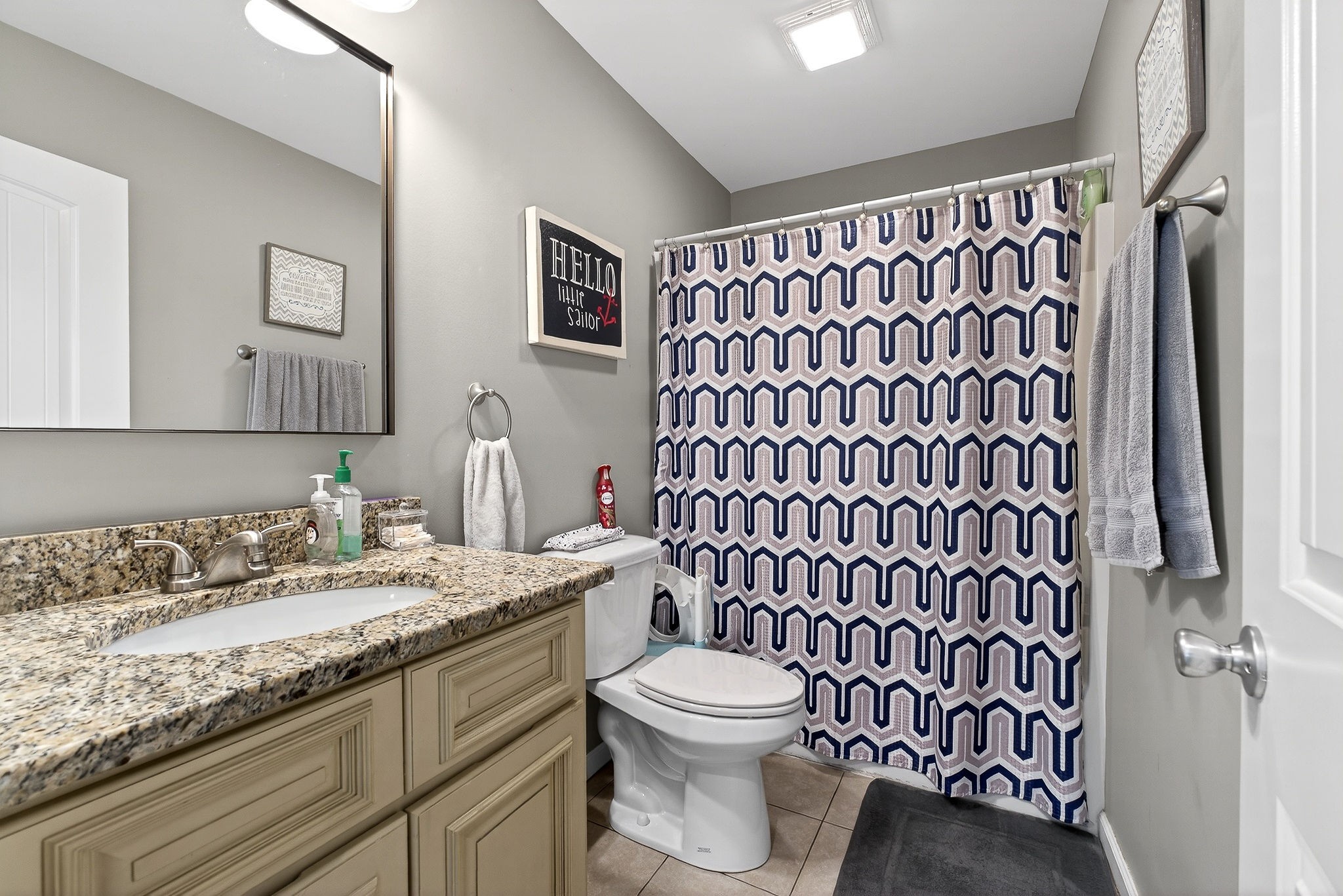 311 Valley Point Baxter, TN 38544 - Photo 27 of 37 a bathroom with a granite countertop sink toilet and shower
