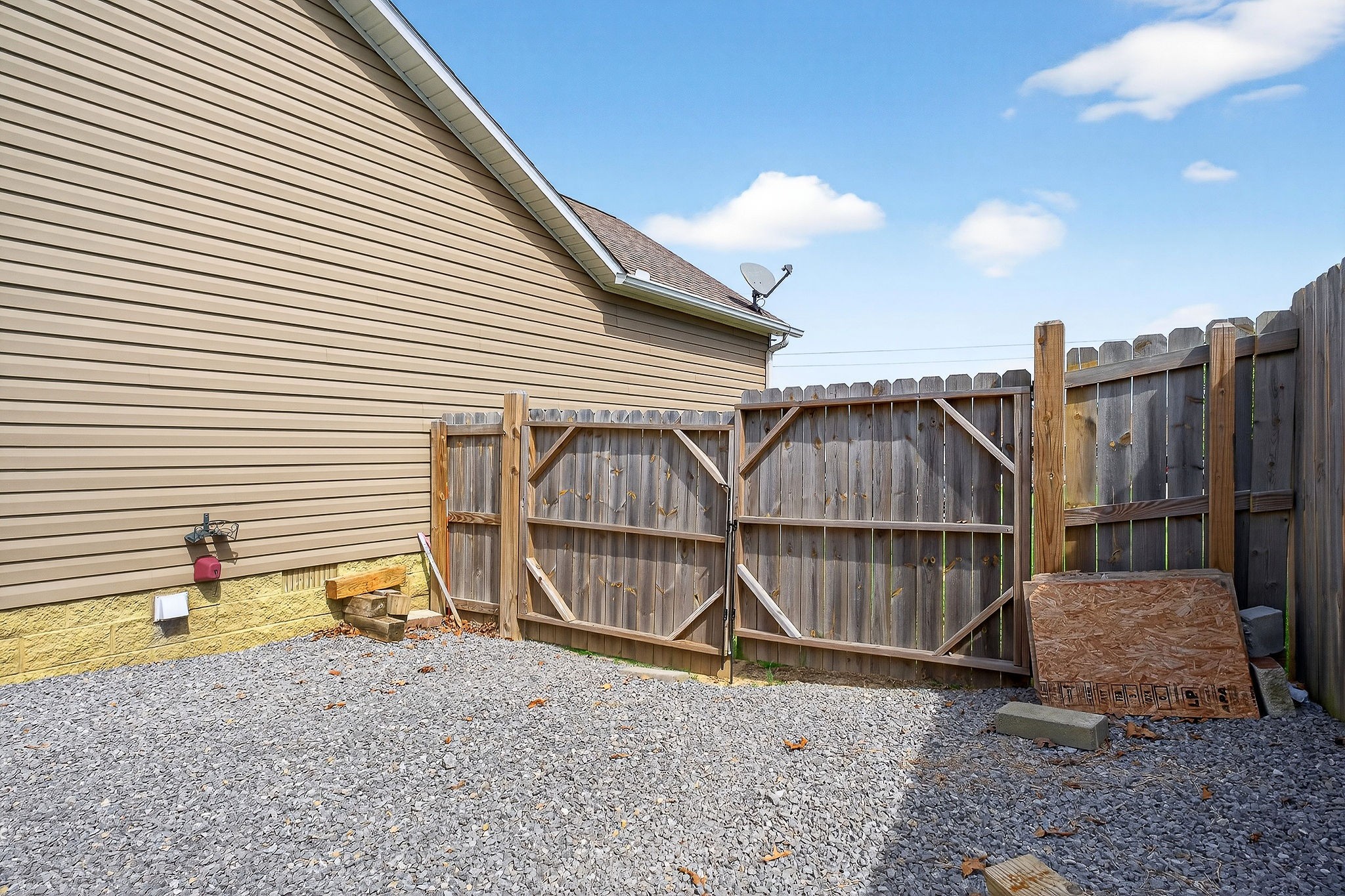 311 Valley Point Baxter, TN 38544 - Photo 5 of 37 a view of a backyard with a wooden fence