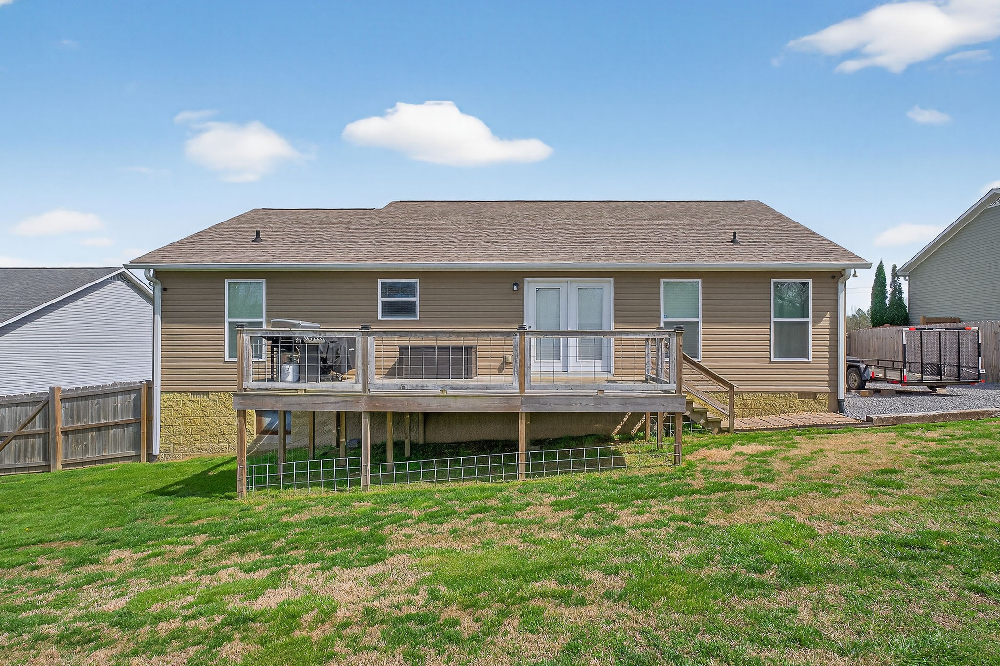 311 Valley Point Baxter, TN 38544 - Photo 8 of 37 a front view of a house with a yard table and chairs